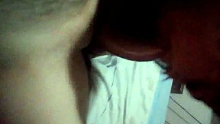 the gay man enjoys a delicious blowjob from his lover in the bedroom