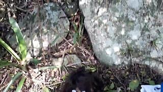 Fucking that submissive slut's ass in the woods.