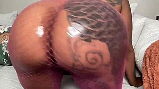 pink fishnets twerk tease in a casual dance session