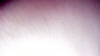 Doctor glazing patient's chocolate body in hospital