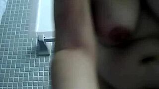 Latina dances erotically while masturbating in video