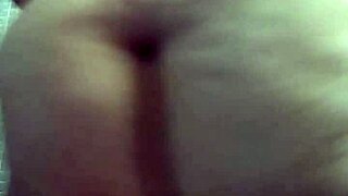 Latina dances erotically while masturbating in video