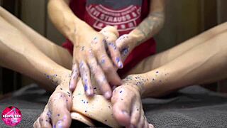 Babe Gives Sensual Footjob to Rubber Cock!