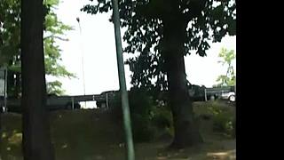 Exhibitionist flaunts big natural tits in the park, teasing with close-ups