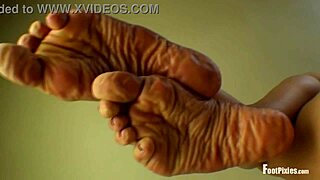 Jade Vixen Strips Black Hose Off, Showing Wrinkled Toes and Feet in Nylon Stockings for Pure Desire.