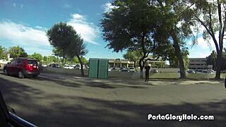 Redhead at Porta Gloryhole Gets Mouth Stuffed with Cum in Public