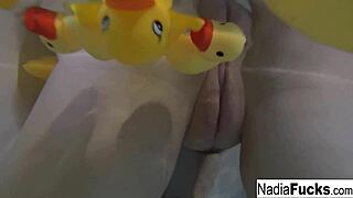 Why does sexy nadia masturbate in the bath with rubber duckies?