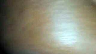 Detailed scene of cum splashing onto a juicy ass in close-up