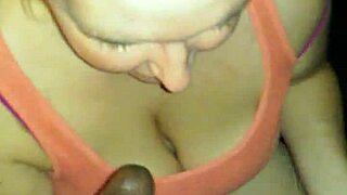 Does the husband watch his wife swallow that big black cock in interracial action?