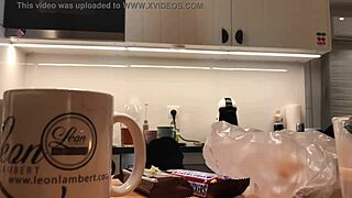 Young wife’s candid moment while doing the dishes with a voyeur cam on