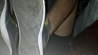 Blue sweaty socks and bare feet end with a sticky cumshot.