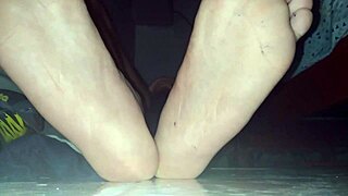 Blue sweaty socks and bare feet end with a sticky cumshot.