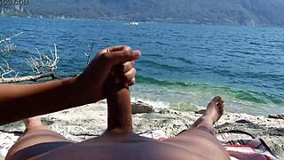 Wow, my wife jerks and sucks me off on a public beach while being watched!