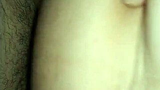 In a quiet room, a young girl indulges in self-pleasure through gentle masturbation and soothing massage techniques.