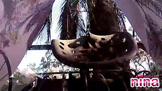 Lesbian Nina teases her clit while rubbing her pussy outdoors