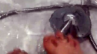 Hungarian babe removes nylon for shower footjob?