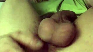 Feeling the stretch as big plug enters small gay ass