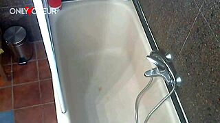 Chubby teen's solo session in the bathtub is erotic
