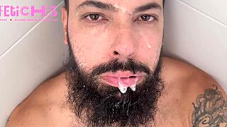 bearded guy gets spit on by handsome man