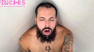 bearded guy gets spit on by handsome man