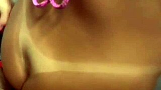 Pretty blonde amateur in lingerie, big tits, and curly hair