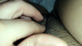 I teased my big clit with tickling fingers until reaching a shuddering orgasm.