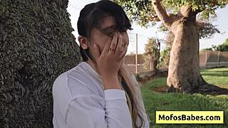 Hey, check out this hot Asian teen showing off her big natural boobs outside!