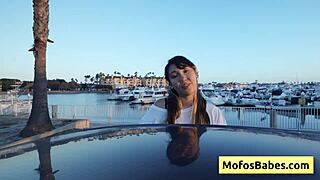 Hey, check out this hot Asian teen showing off her big natural boobs outside!