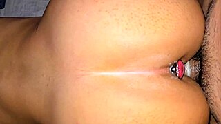 Damn! Watch me take it doggystyle with a plug stretching my tight ass!