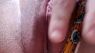 She rubs her clit close up until bursting