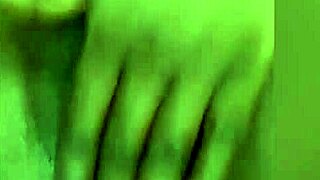 Amateur black woman fingers her small tits and squirts during homemade masturbation session