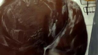 Naejae strokes hard under the shower spray