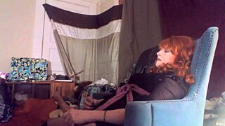 Sexy redhead tranny Ms Head swallows 8-inch vibrating dildo