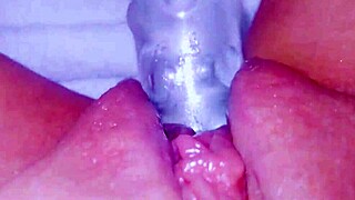 curious coed squirts huge on glass toy