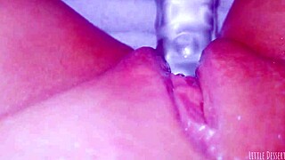 curious coed squirts huge on glass toy