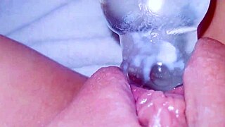 curious coed squirts huge on glass toy