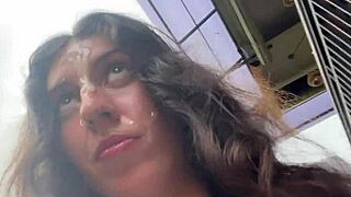 Girl walks with cum on face in busy cafe