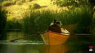 a beautiful brunette with small tits gave a handjob and rode a strong man in doggystyle on a boat