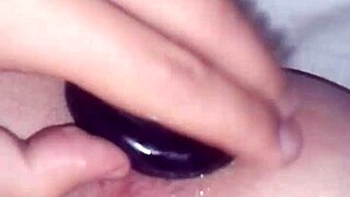 Jimena Simpson, a stunning tranny, pounds a black dildo in wild action