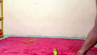 A girl has sex with her boyfriend using a cucumber in his ass
