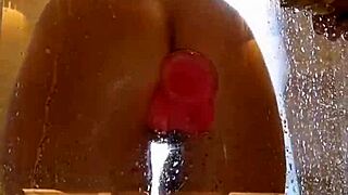 girl with juicy ass plays in shower with pink toy
