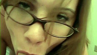 she looks at you with glasses grabs your ass then blows your cock until it cums