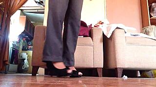 Shemale Struts Boldly In Black High Heels!