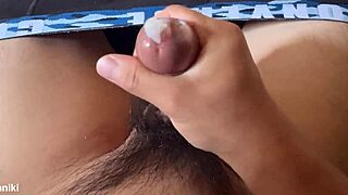 Asian Amateur Masturbates Solo with Condom On