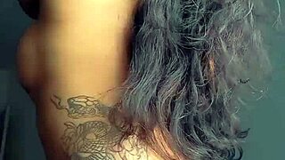 The tattooed prostitute showcases her body in a steamy anal session