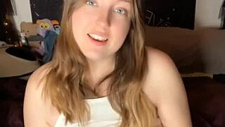 she sucks on the dildo before playing with her pussy