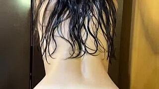 Young teen steps out of shower in dorm