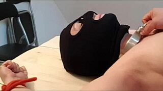 Amateur milf slave tied on desk, taken hard, and masturbated with candles