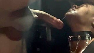 Ebony couple engages in deepthroat training with big black cock