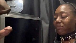 Ebony couple engages in deepthroat training with big black cock